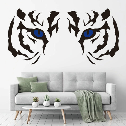 Tiger eyes wall decal with blue accents above grey sofa in modern living room, YKLT Decals