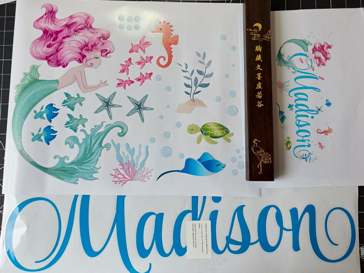 Ocean themed wall decals for girls room with mermaid and sea life designs
