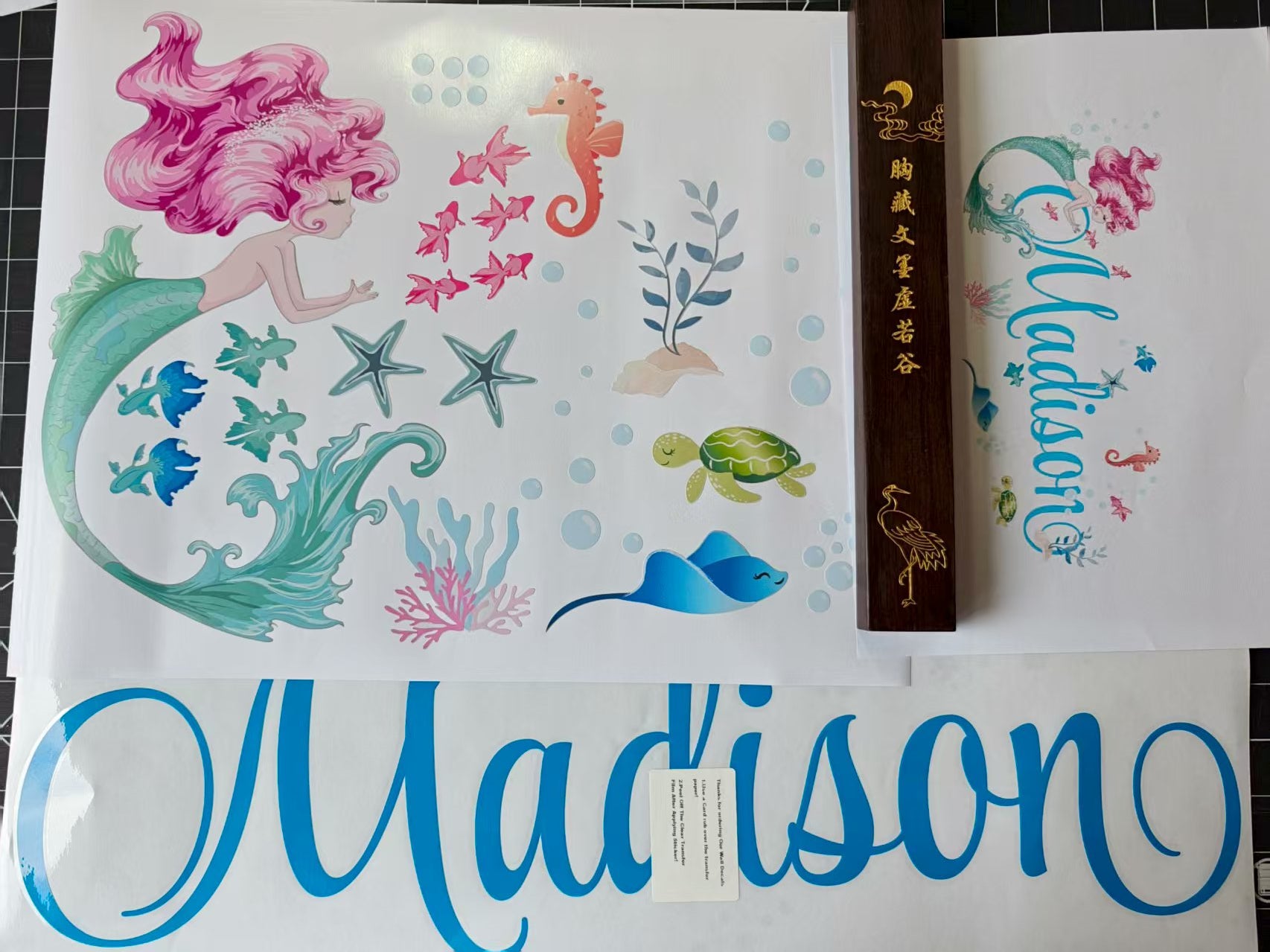 Ocean themed wall decals for girls room with mermaid and sea life designs
