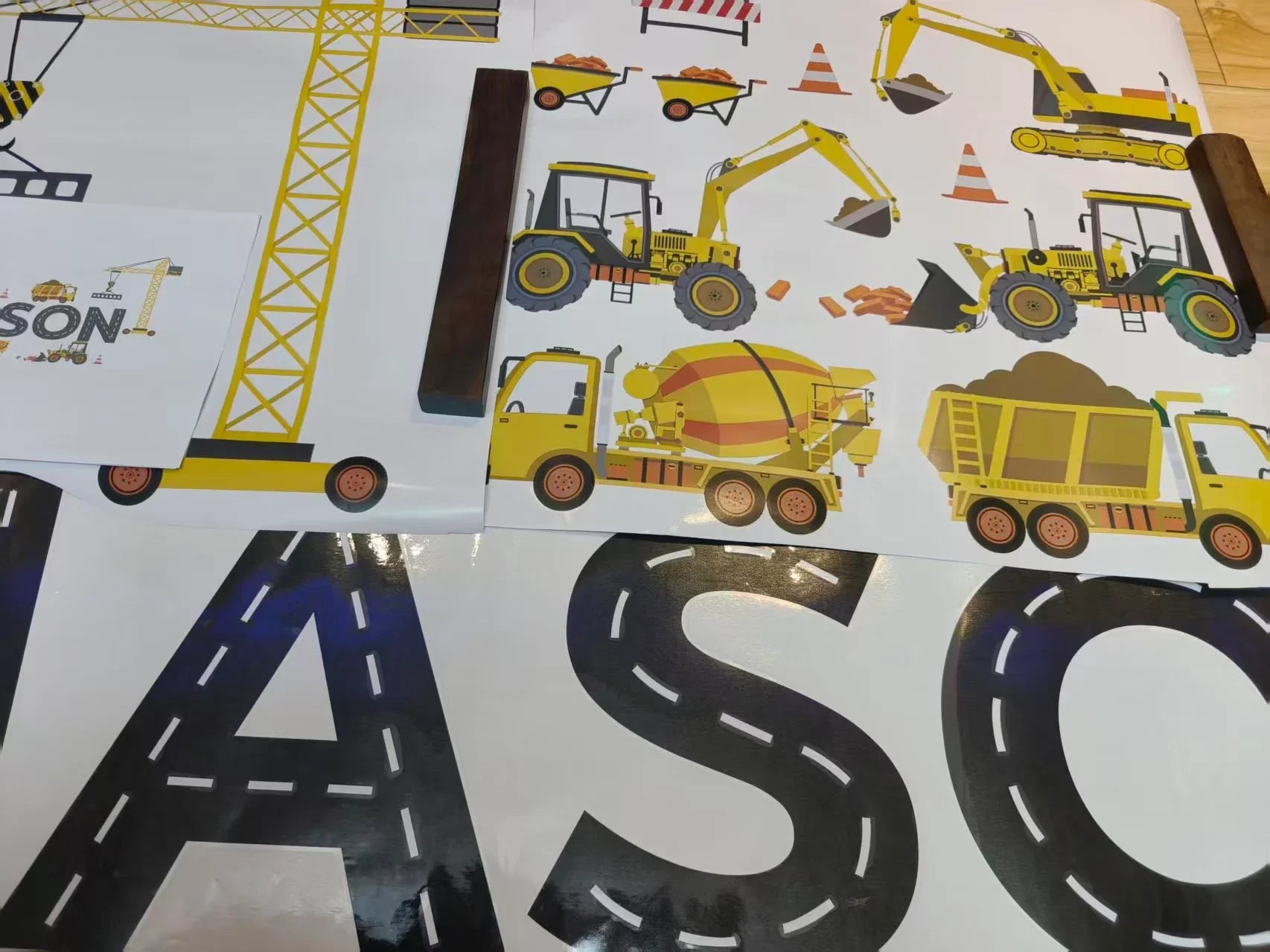 Construction vehicle wall decals set with crane, trucks, and road letters from YKLT Decals