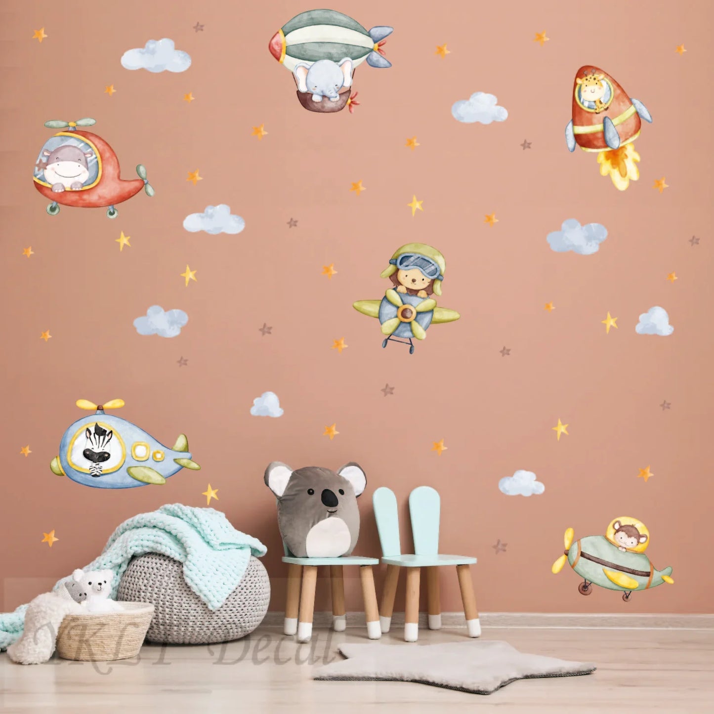 Cute animal pilot wall decals with planes and rockets in a nursery room, YKLT Decals decor.