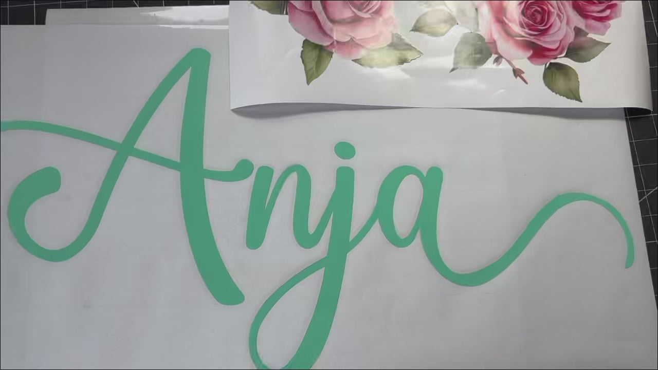 Custom pink flower wall decal installation and application video
